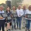 paolo corsiglia con i vincitori coldiretti premio olio dop