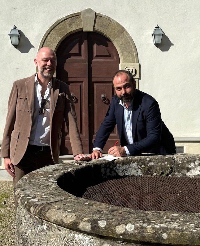 francesco sorelli left and grardo gondi right signing